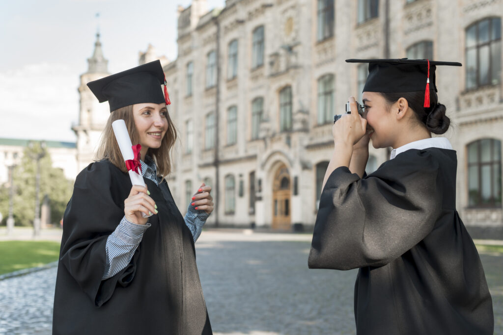 students-taking-photo-each-other-graduation